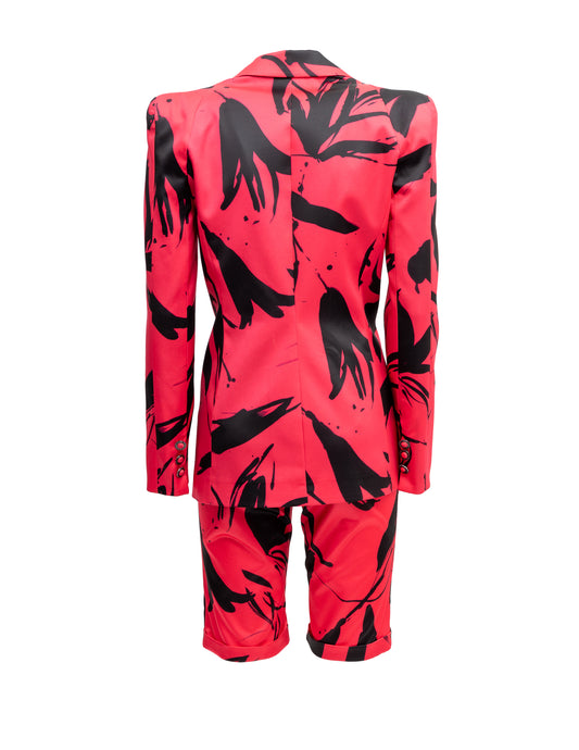 Blazer Cosmina Suçiu Passione Arte donna fucsia con stampa astratta nera e revers a lancia lucidi.